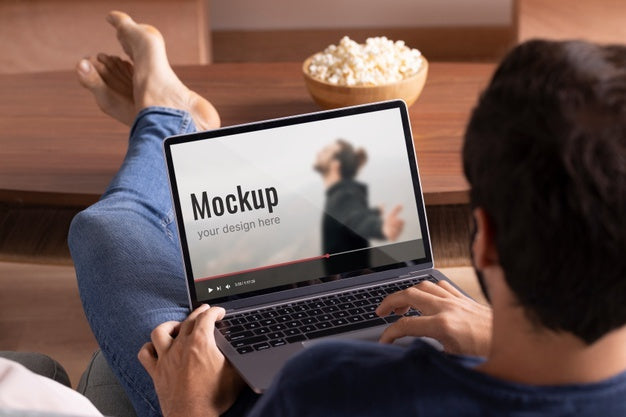 Free Close Up Man Watching Movie On Laptop Psd