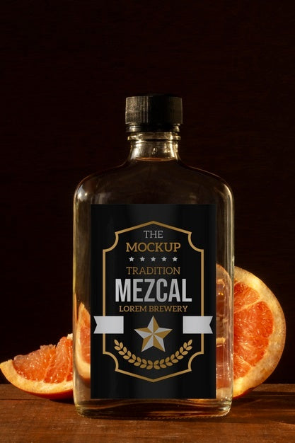 Free Close Up On Mezcal Drink Bottle With Ingredients Psd