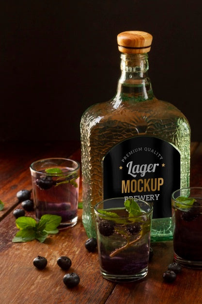 Free Close Up On Mezcal Drink Bottle With Ingredients Psd