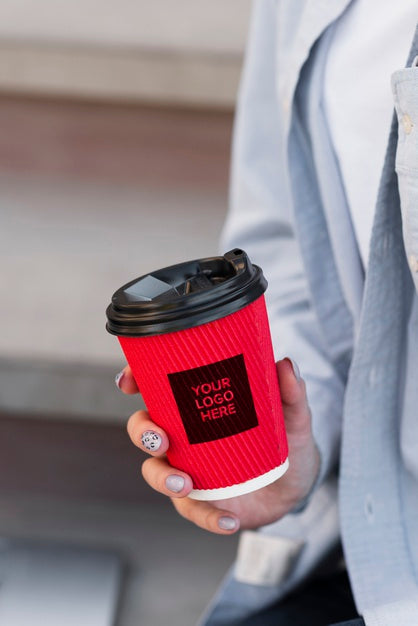 Free Close-Up Woman Holding A Cup Of Coffee Mock-Up Psd