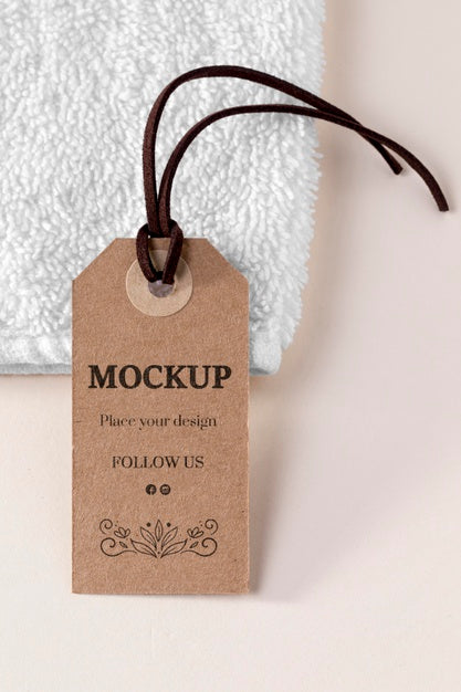 Free Clothing Mock-Up Tag And White Towel Psd