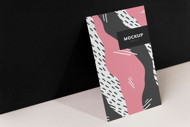 Free Colorful Paperboard Mockup Against The Black Wall Psd