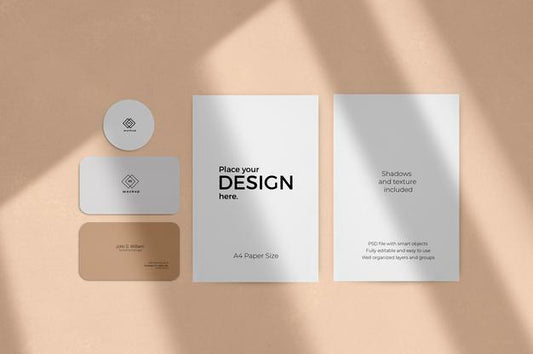 Free Corporate Stationary Set Mockup With Window Shadow Effect On A Beige Wall Psd