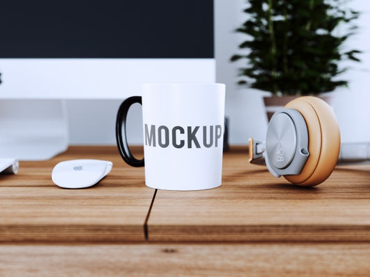 Free Cup On Wooden Desk Mock Up Psd