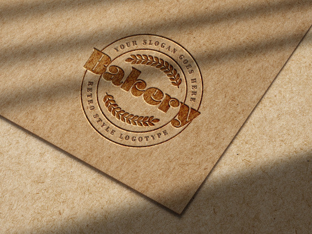 Free Debossed Logo Mockup On Kraft Paper Psd