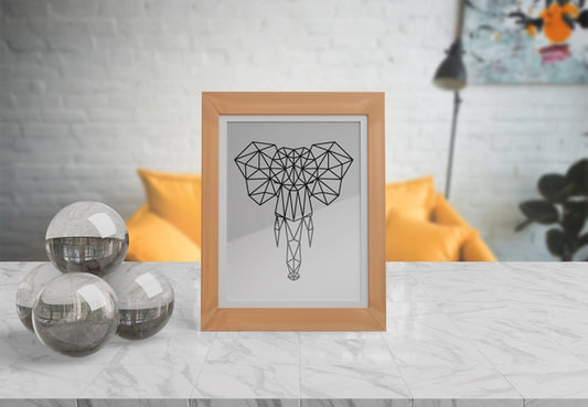 Free Decorative Frame Mockup On Table At Home Psd