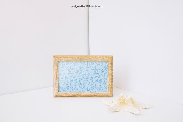 Free Decorative Photo Frame Mockup With Starfish Psd