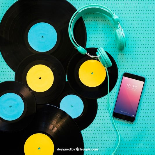 Free Decorative Vinyl Mockup With Smartphone Psd