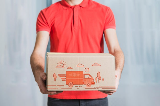 Free Delivery Mockup With Man Holding Box Psd