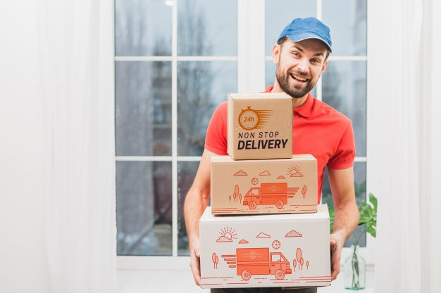 Free Delivery Mockup With Man Holding Boxes Psd