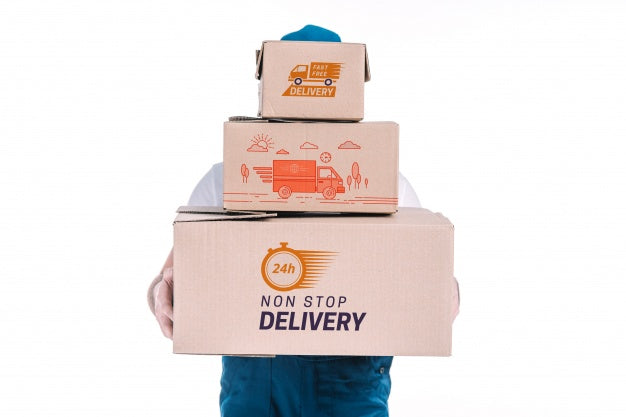 Free Delivery Mockup With Man Holding Boxes Psd