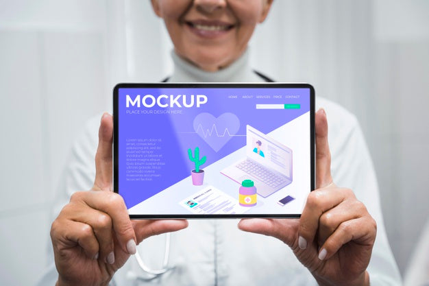 Free Doctor Holding Tablet Mock-Up Psd