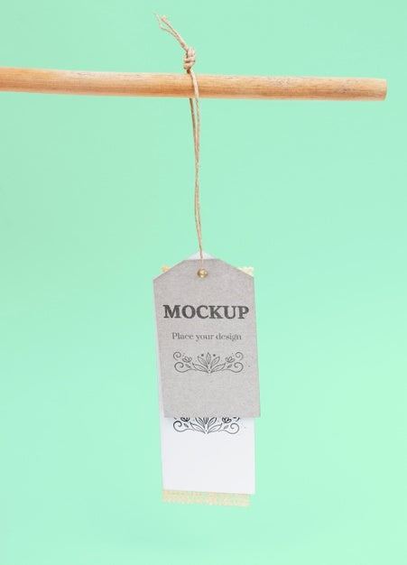 Free Ecological Tags Hanging With Green Background Psd