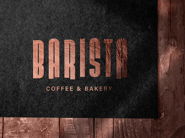 Free Embossed Bronze Logo Mockup On Dark Paper Psd