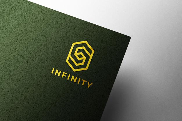 Free Embossed Golden Logo Mockup On Green Kraft Paper Psd