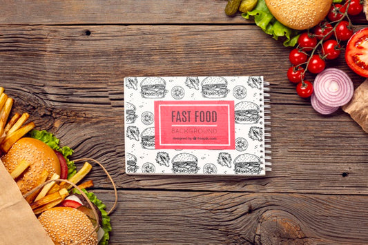 Free Fast Food And Veggies On Wooden Background Psd