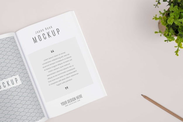 Free Flat Lay Desk Arrangement With Open Book Mockup Psd