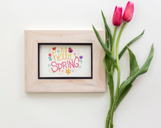 Free Flat Lay Frame Mockup With Spring Flowers Psd