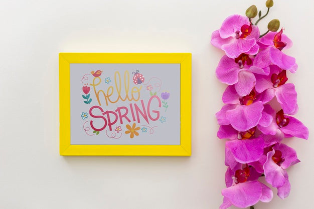 Free Flat Lay Frame Mockup With Spring Flowers Psd