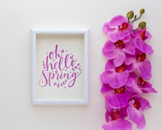 Free Flat Lay Frame Mockup With Spring Flowers Psd