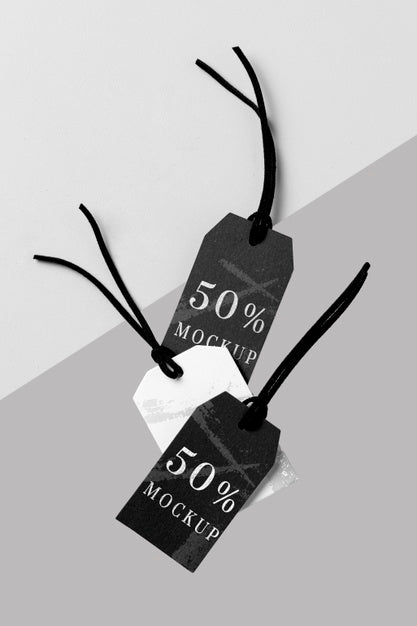 Free Flat Lay Mock-Up Arrangement Of Black And White Clothing Tags Psd