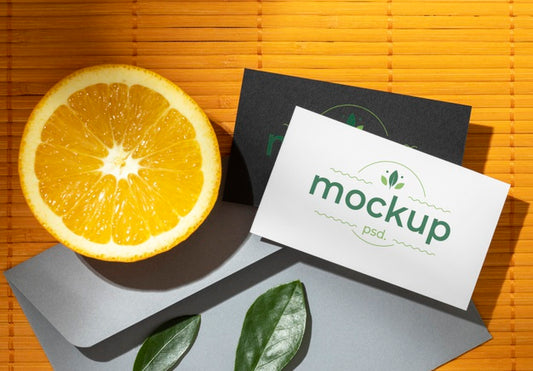 Free Flat Lay Of Paper Stationery With Citrus And Leaves Psd