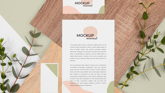 Free Flat Lay Stationery With Leaves And Wood Psd