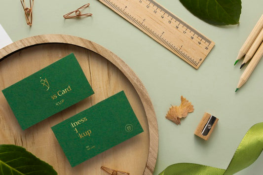 Free Flat Lay Stationery With Wood And Plant Psd