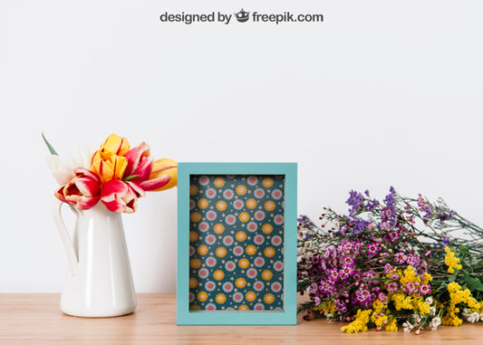 Free Floral Mockup Of Blue Frame Psd