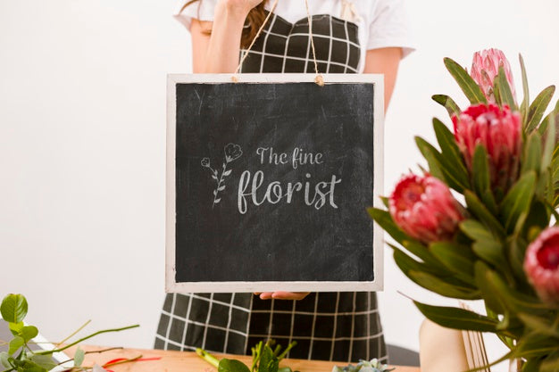 Free Florist Holding Mock-Up Sign Psd