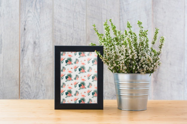 Free Frame Mockup Next To Plants Psd