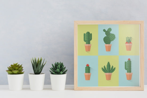 Free Frame Mockup Next To Plants Psd