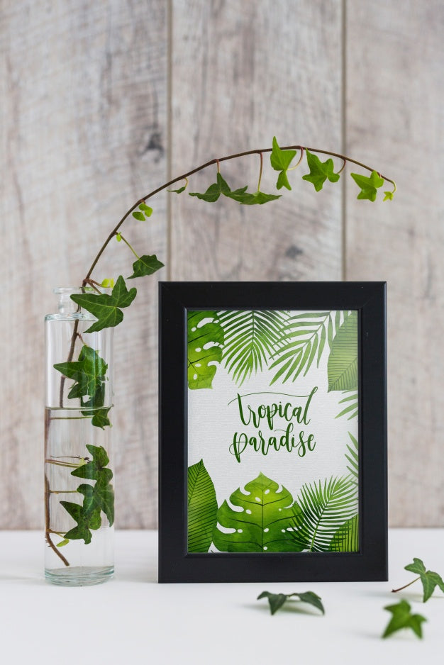 Free Frame Mockup Next To Plants Psd