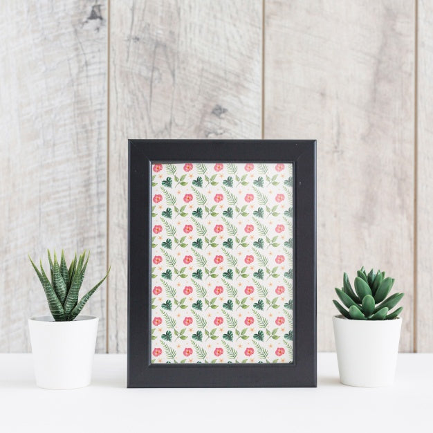 Free Frame Mockup Next To Plants Psd