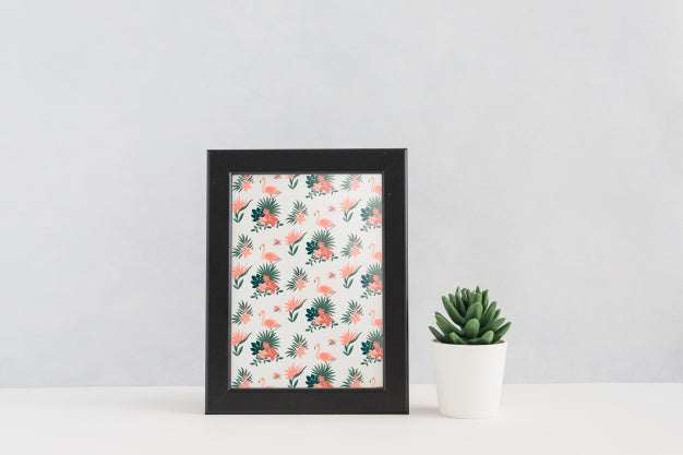 Free Frame Mockup Next To Plants Psd