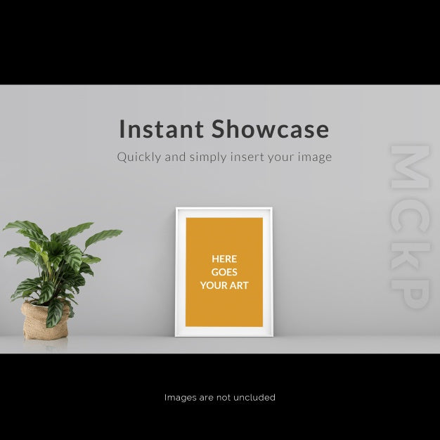 Free Frame On Grey Wall With Plant Mock U Psd