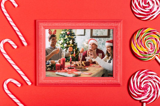 Free Framed Family Photo With Sugar Canes And Lollipops Psd