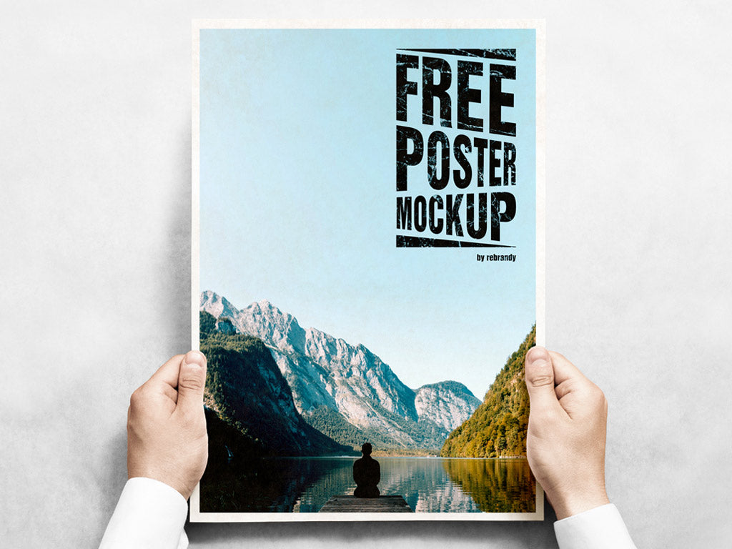 Free PSD Mockup of Hands holding a Poster