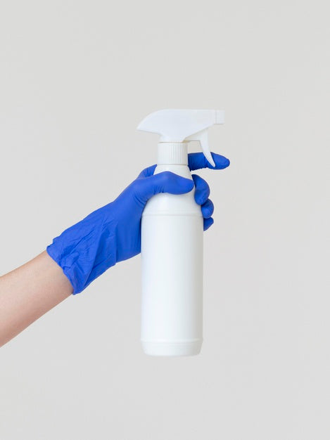 Free Front View Hand Holding Disinfection Bottle Mock-Up Psd