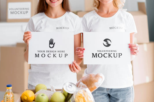 Free Front View Of Female Volunteers Holding Blank Papers Next To Food Box Psd