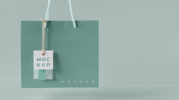 Free Front View Of Paper Shopping Bag Mock-Up With Paper Tag Psd