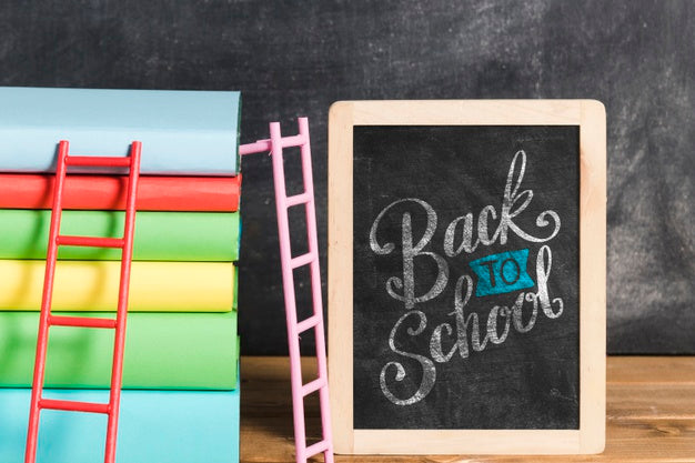 Free Front View Pile Of Books With Chalkboard Psd