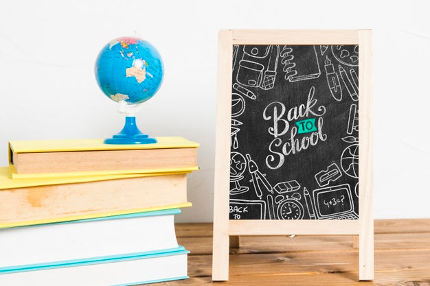 Free Front View Pile Of Books With Chalkboard Psd