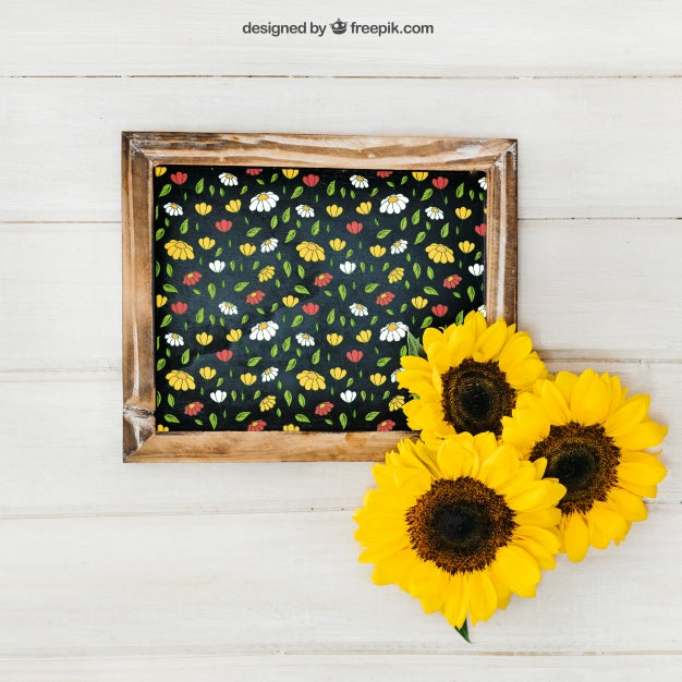 Free Gardening Mockup With Slate And Three Sunflowers Psd