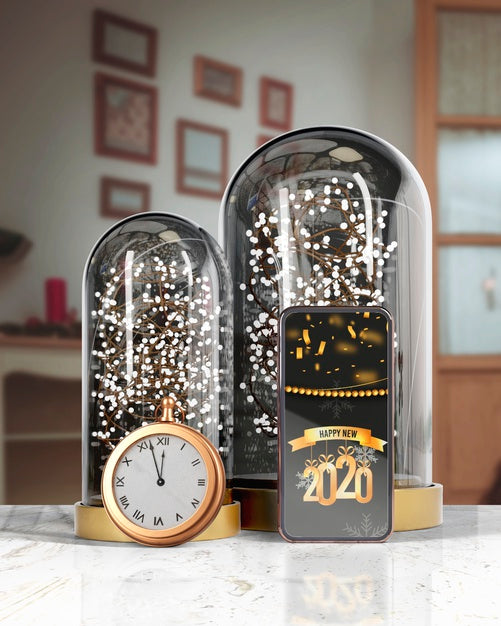 Free Globes Supporting Phone With Message For New Year Psd