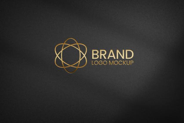 Free Golden Logo On Black Textured Paper Mockup Psd