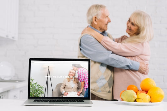 Free Grandparents Behind Laptop Mockup Psd