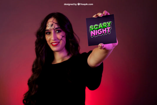 Free Halloween Mockup With Girl Presenting Card Psd