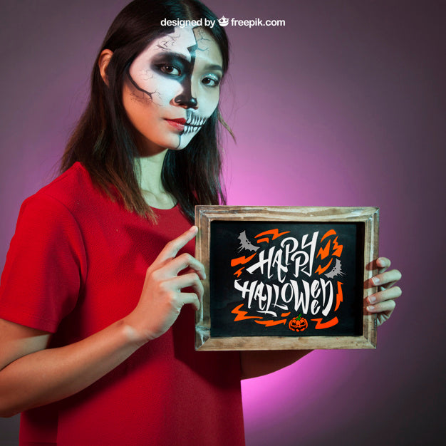 Free Halloween Mockup With Girl Presenting Slate Psd