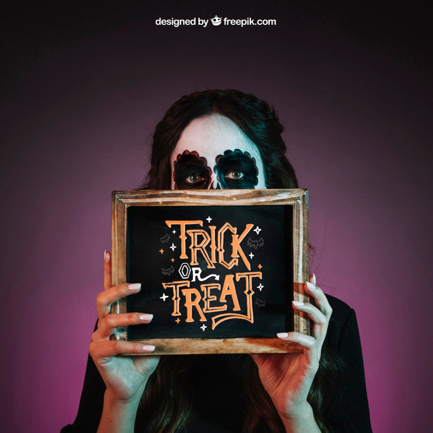 Free Halloween Mockup With Girl Showing Slate Psd